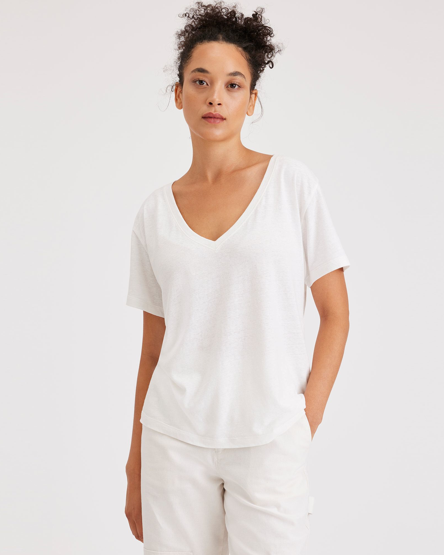 Front view of model wearing Lucent White Deep V-Neck Tee, Regular Fit.