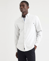 Front view of model wearing Lucent White Essential Button-Up Shirt, Classic Fit.