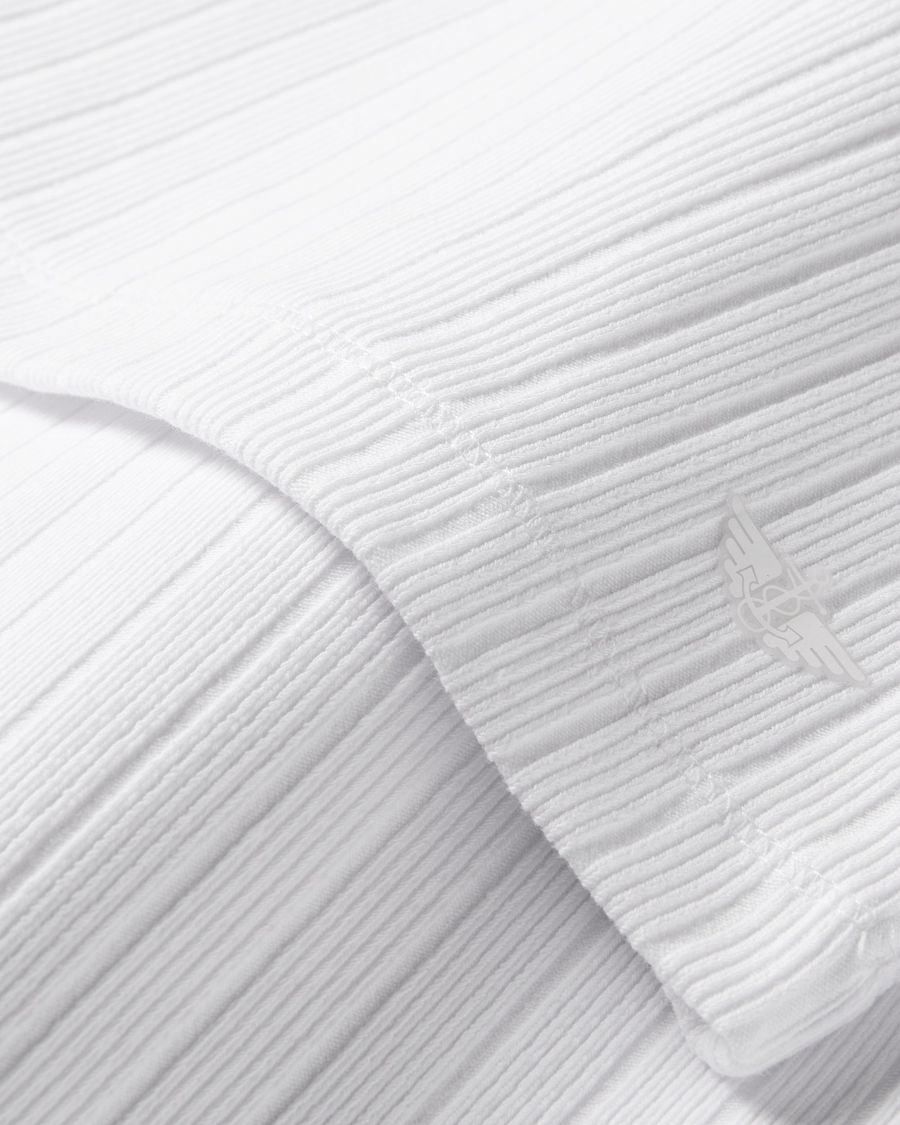 View of model wearing Lucent White Go Quarter-Zip Pullover, Slim Fit.