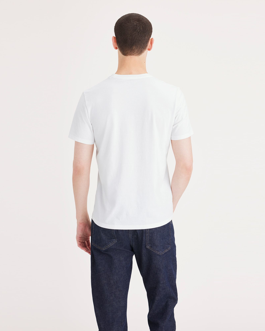 Back view of model wearing Lucent White Graphic Tee, Slim Fit.