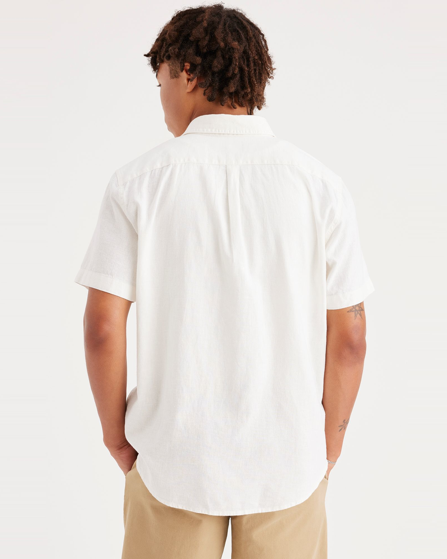 Back view of model wearing Lucent White Original Button Up, Regular Fit.