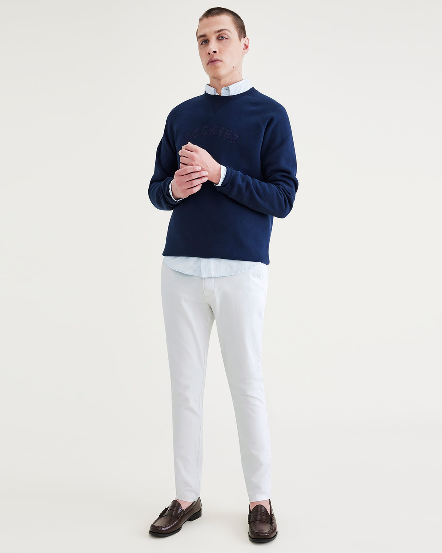 Front view of model wearing Lucent White Ultimate Chinos, Skinny Fit.