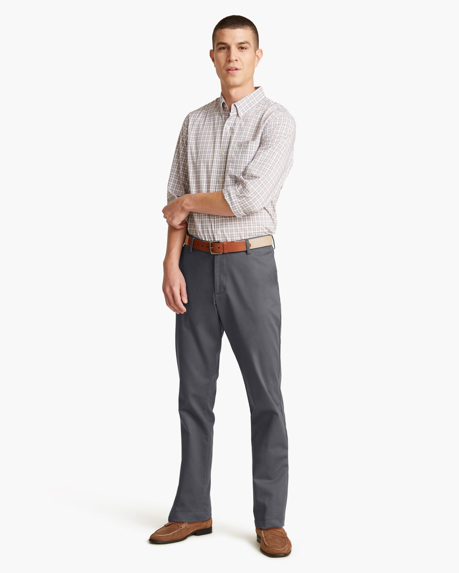 Front view of model wearing Magnet Signature Khakis, Slim Fit.