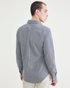 Back view of model wearing Manchester Navy Blazer Original Button Up, Slim Fit.