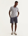 Front view of model wearing Maritime Blue Perfect 8" Shorts.