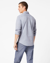 Back view of model wearing Medieval Blue Signature Comfort Flex Shirt, Classic Fit (Big and Tall).