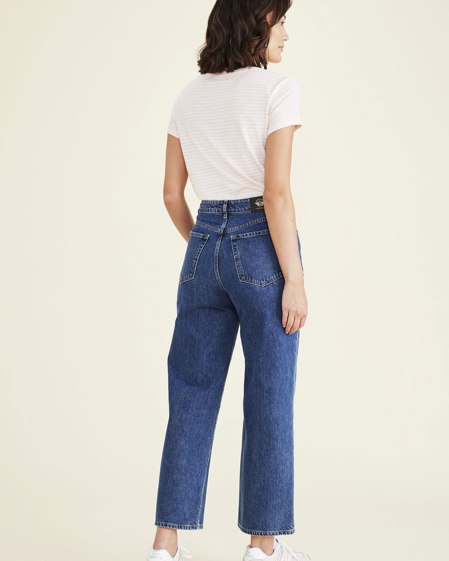 Back view of model wearing Medium Indigo Stonewash Jean Cut Pants, High Straight Fit.