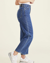 Side view of model wearing Medium Indigo Stonewash Jean Cut Pants, High Straight Fit.