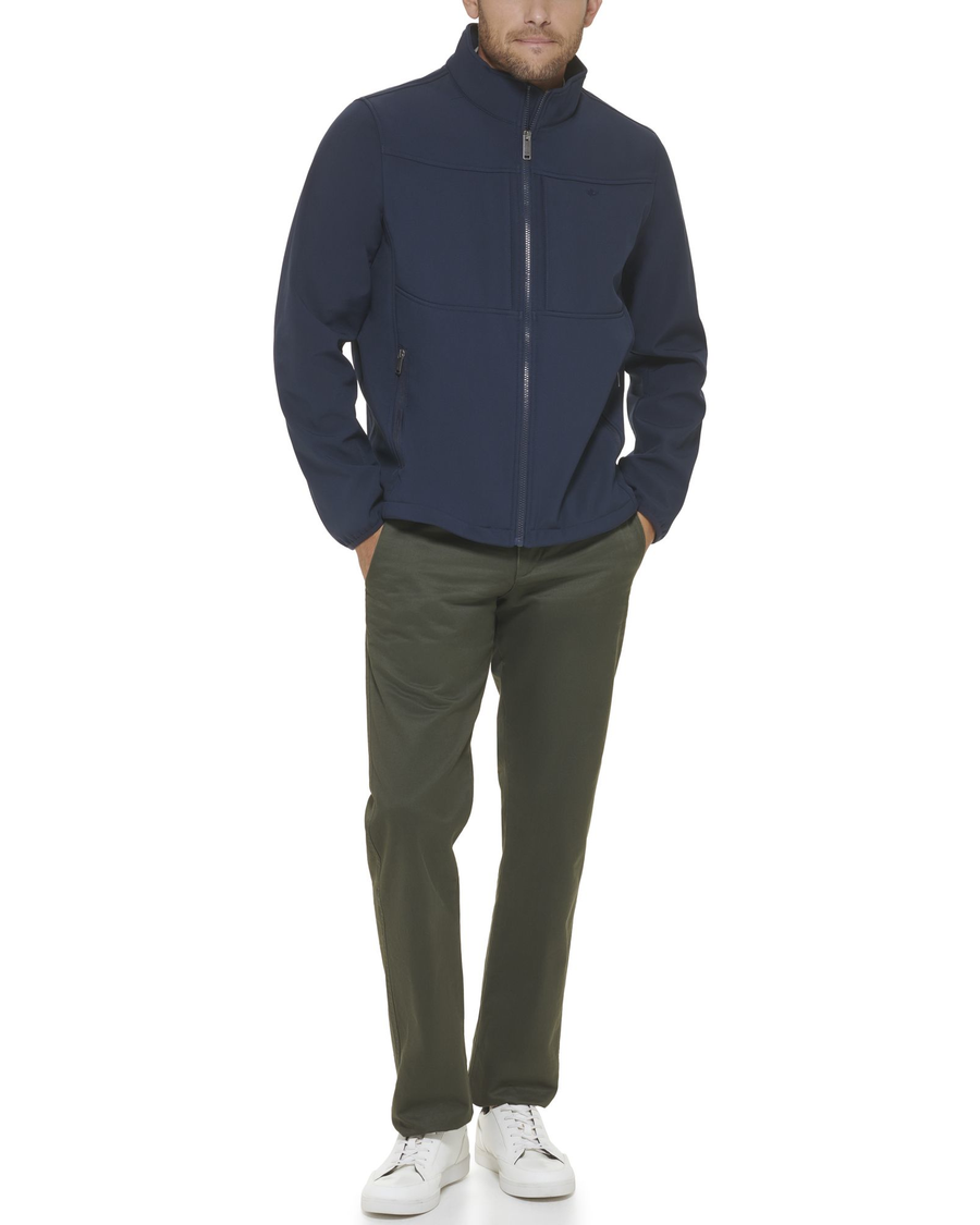 Front view of model wearing Midnight Chest Yoke Softshell Jacket.