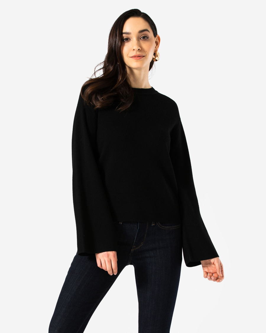 Front view of model wearing Mineral Black Bell Sleeve Sweater.