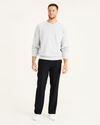 Front view of model wearing Mineral Black Comfort Knit Chinos, Straight Fit.