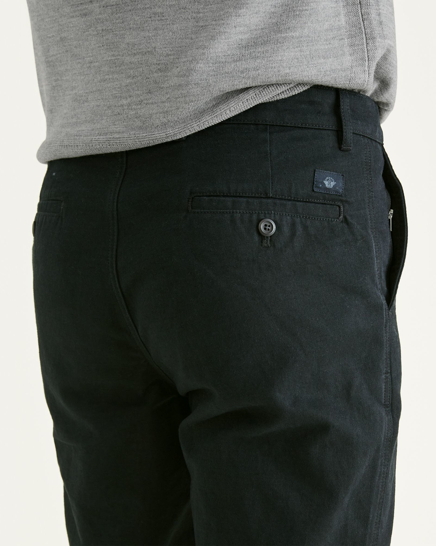 View of model wearing Mineral Black Original Chinos, Straight Fit.