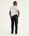 Back view of model wearing Mineral Black Original Chinos, Straight Tapered Fit.