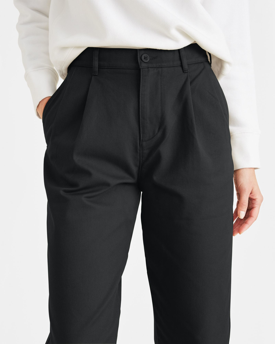 View of model wearing Mineral Black Original Khakis, Pleated, High Waisted Tapered Fit.