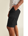 View of model wearing Mineral Black Perfect Cargo 10.5" Shorts, Classic Fit.