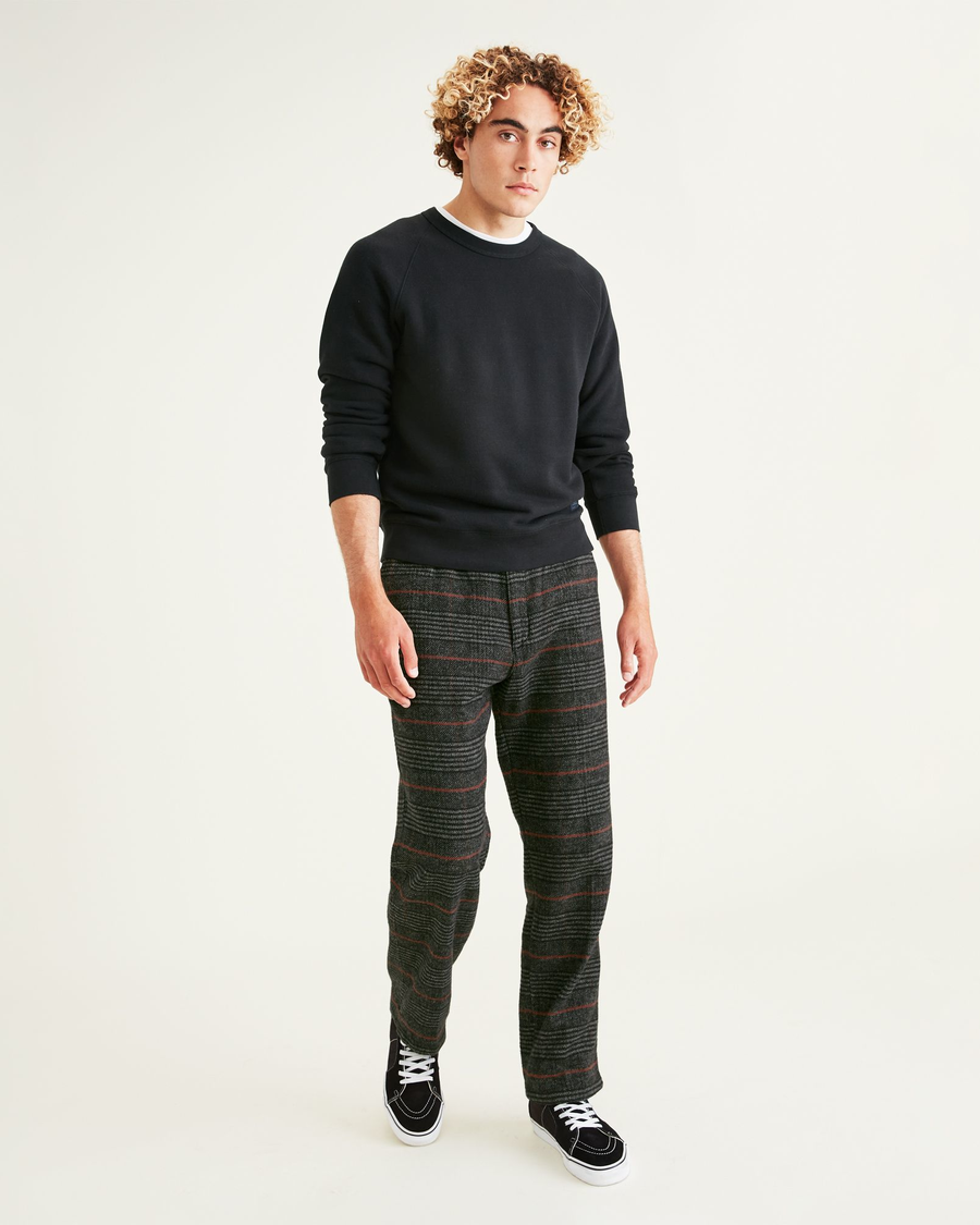 Front view of model wearing Mineral Black Pull On Chinos, Tapered Fit.
