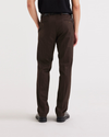 Back view of model wearing Mole Signature Iron Free Khakis, Slim Fit with Stain Defender®.