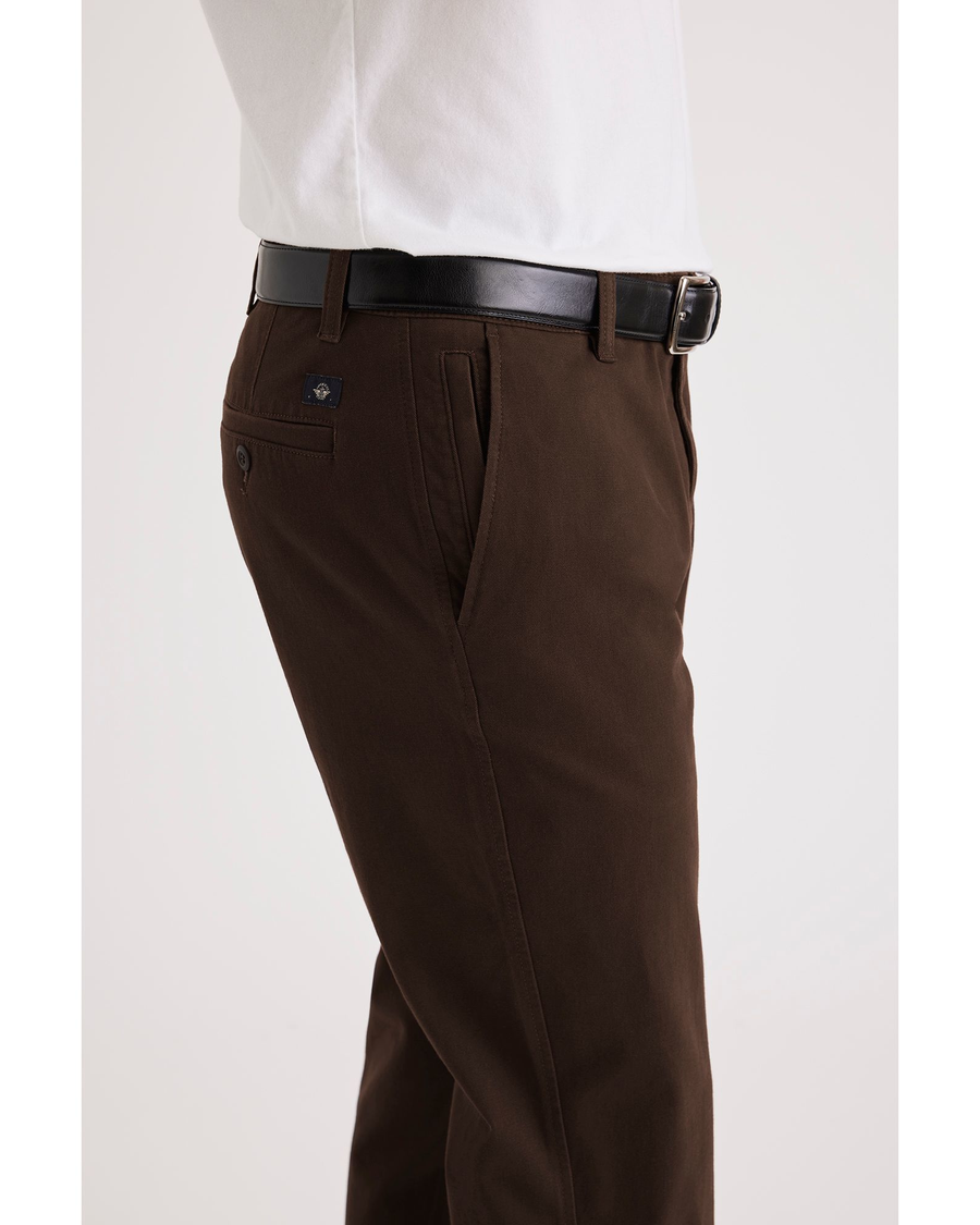 Side view of model wearing Mole Ultimate Chino, Slim Fit.