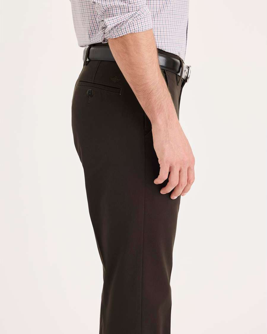 Side view of model wearing Mole Workday Khakis, Slim Fit.