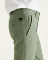 View of model wearing Mulled Basil Comfort Knit Chinos, Straight Fit.