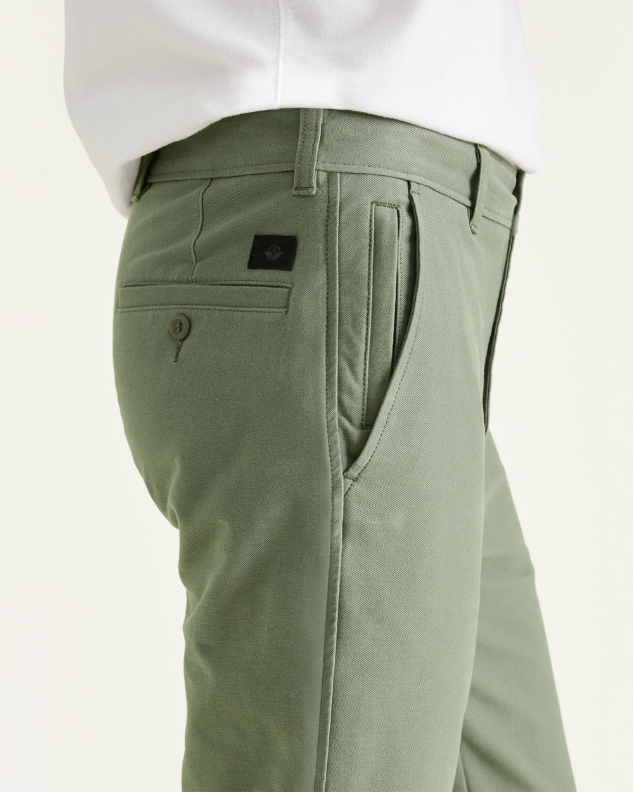 View of model wearing Mulled Basil Comfort Knit Chinos, Straight Fit.