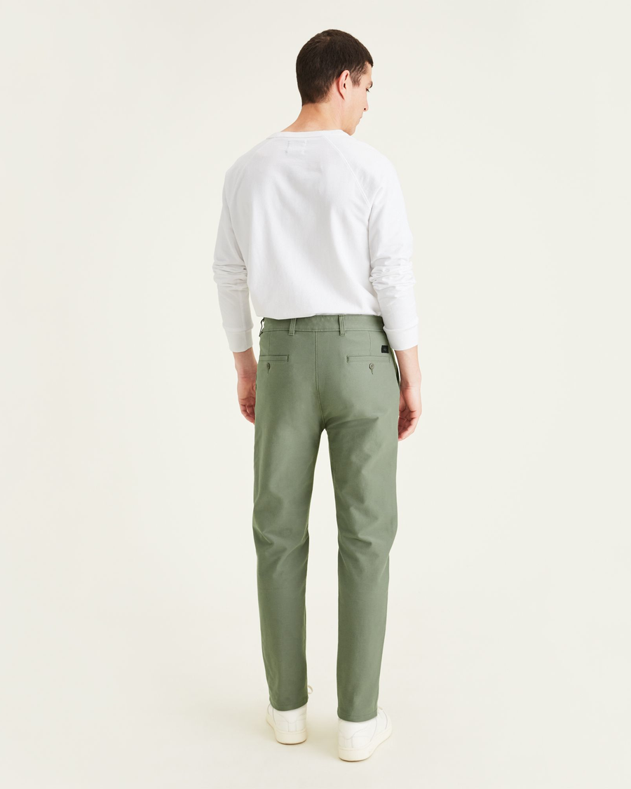 Back view of model wearing Mulled Basil Comfort Knit Chinos, Straight Fit.