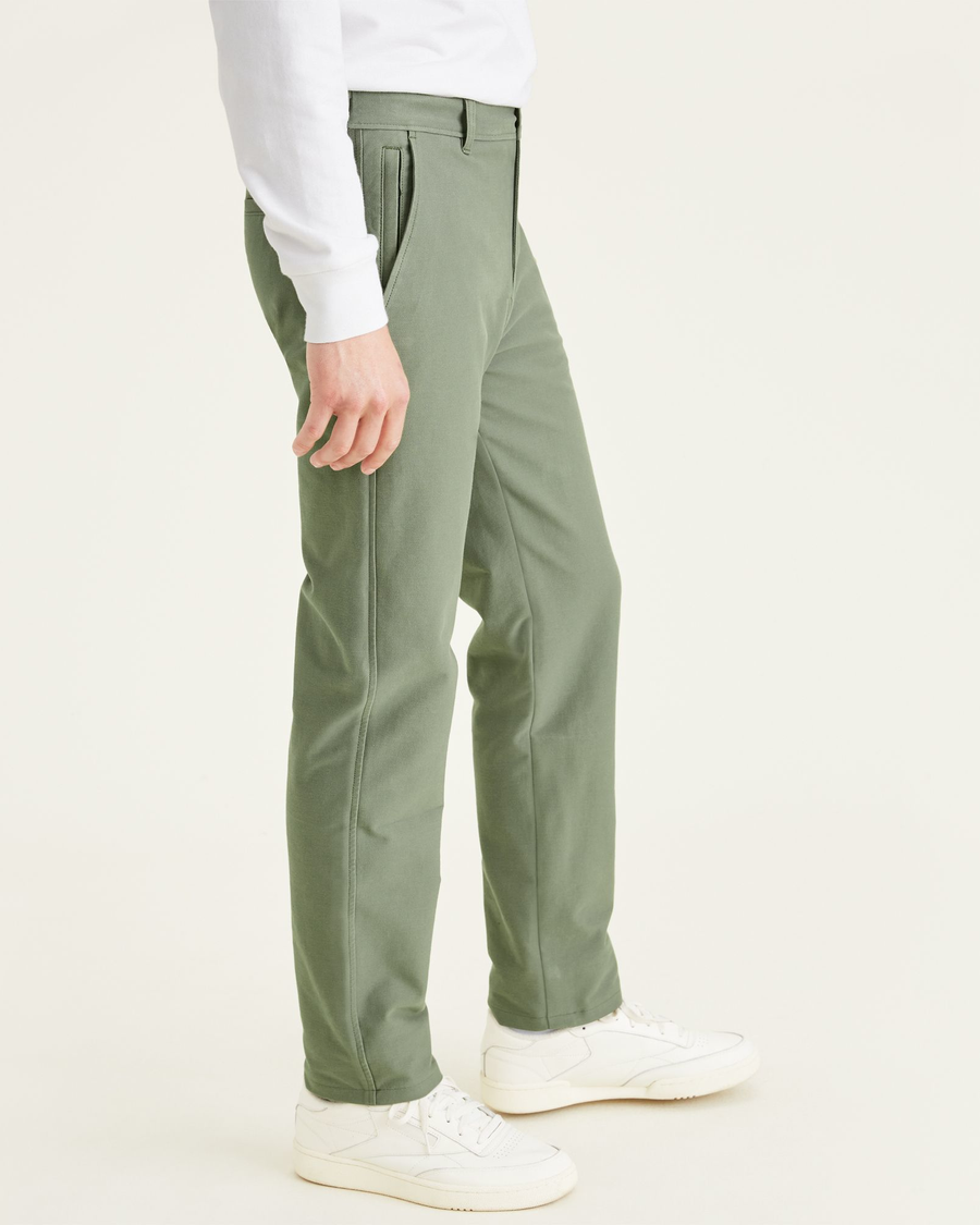 Side view of model wearing Mulled Basil Comfort Knit Chinos, Straight Fit.