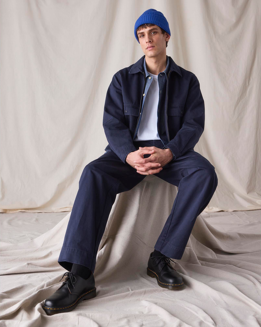 View of model wearing Navy Blue Dockers® x Transnomadica Mechanics Jacket, Regular Fit.