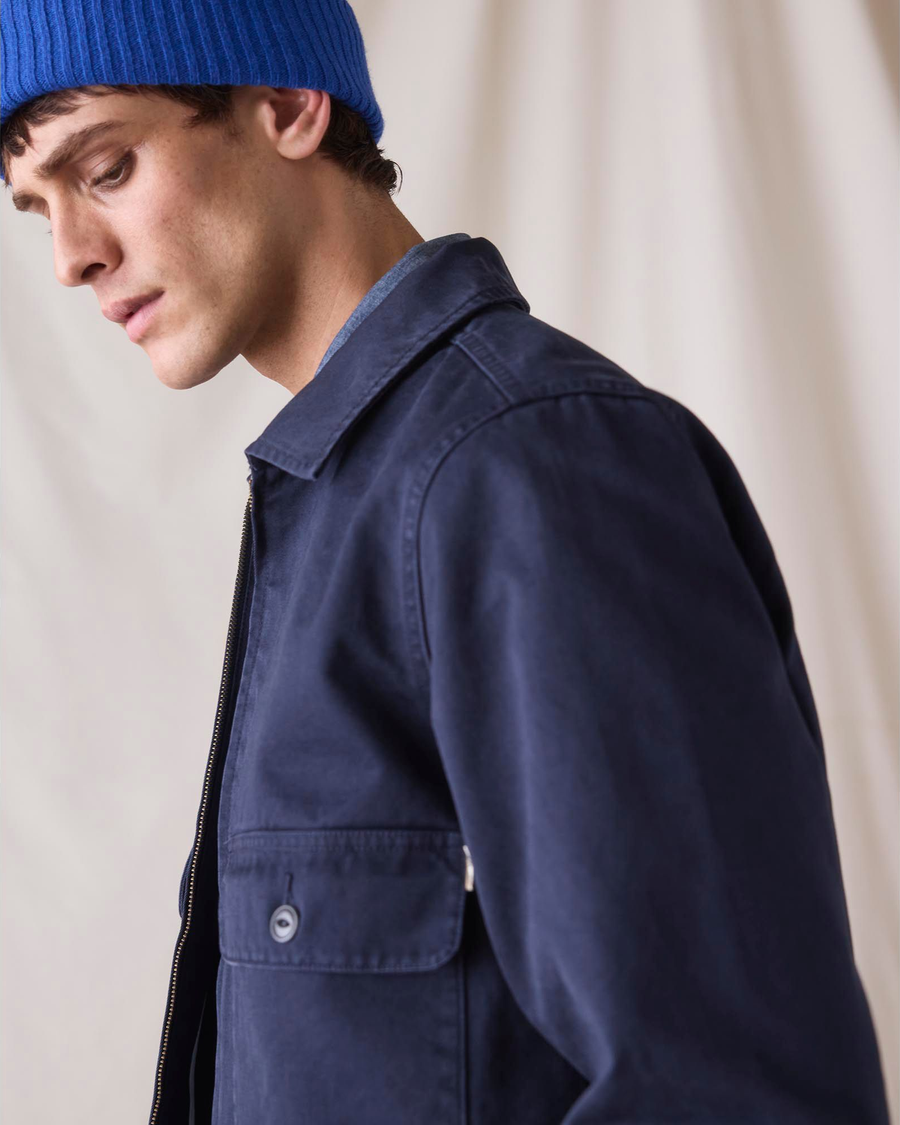 View of model wearing Navy Blue Dockers® x Transnomadica Mechanics Jacket, Regular Fit.