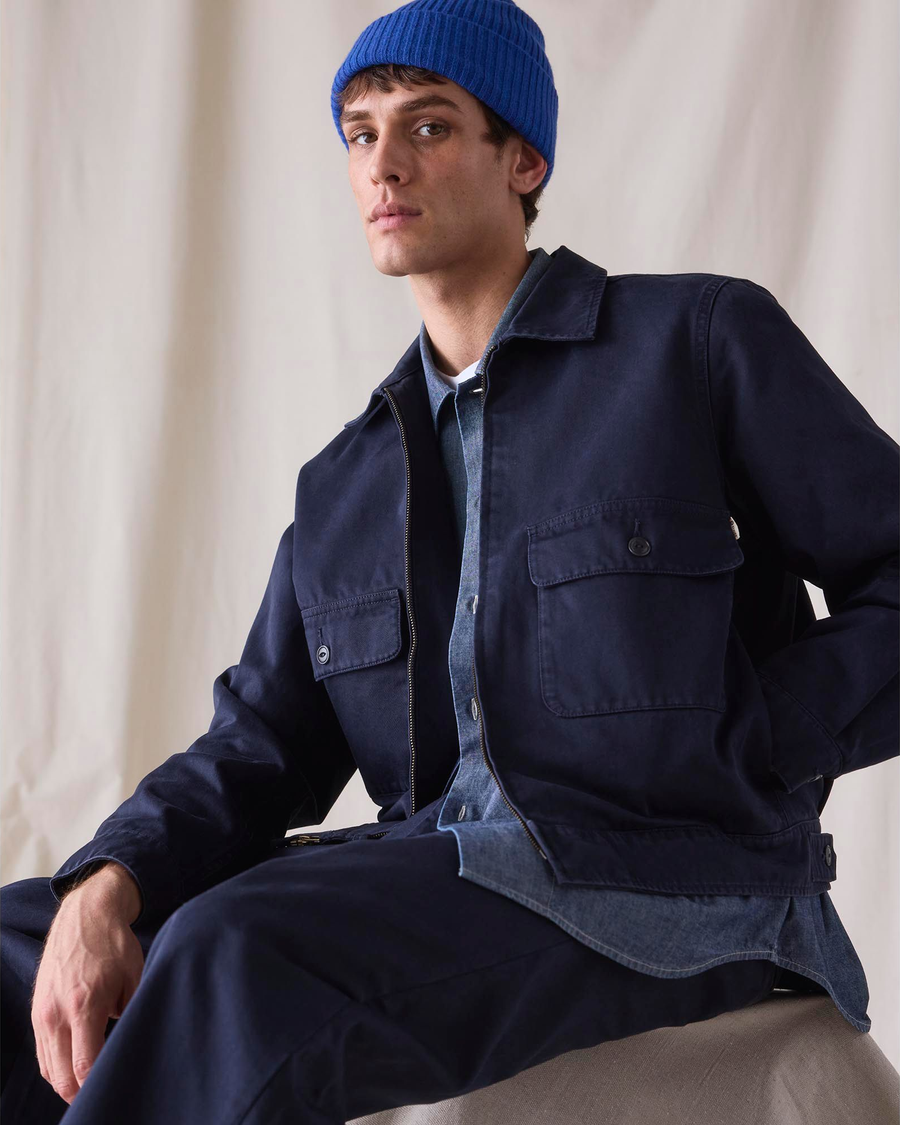 Front view of model wearing Navy Blue Dockers® x Transnomadica Mechanics Jacket, Regular Fit.