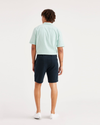 Back view of model wearing Navy Blazer California 8" Shorts.