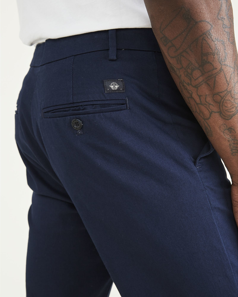 View of model wearing Navy Blazer Coast Trousers, Slim Fit.