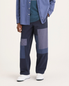 Front view of model wearing Navy Blazer Eighty-Six Alpha Chino Patch Pants, Loose Fit.