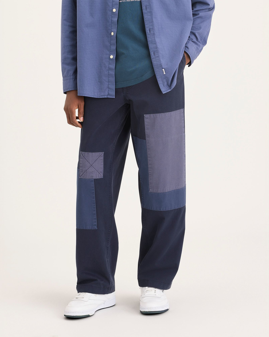 Front view of model wearing Navy Blazer Eighty-Six Alpha Chino Patch Pants, Loose Fit.