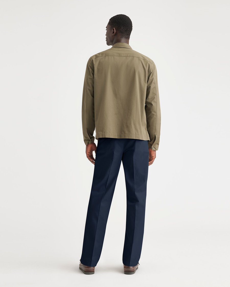 Back view of model wearing Navy Blazer Essential Chinos, Classic Fit.