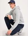 View of model wearing Navy Blazer Go Airweave Chino, Straight Fit.