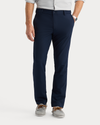 View of model wearing Navy Blazer Go Pro Pant with AceFlex, Slim Fit.