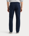 View of model wearing Navy Blazer Go Pro Pant with AceFlex, Slim Fit.