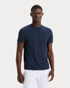 Front view of model wearing Navy Blazer Go Tee, Slim Fit.