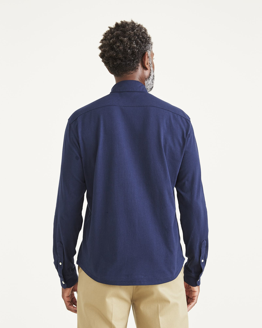 Back view of model wearing Navy Blazer Knit Button-Up Shirt, Regular Fit.