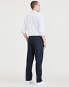 Back view of model wearing Navy Blazer Signature Iron Free Khakis, Pleated, Classic Fit with Stain Defender® (Big and Tall).