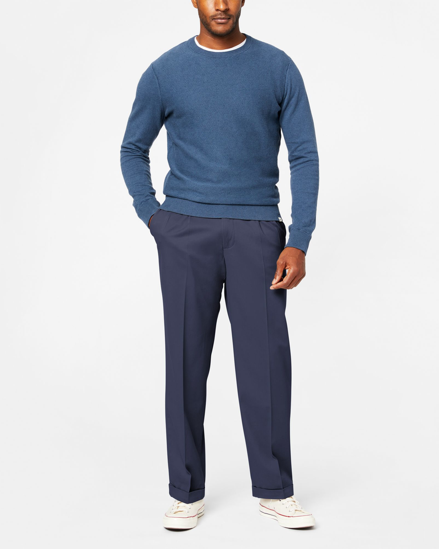 Front view of model wearing Navy Comfort Khakis, Pleated, Relaxed Fit.