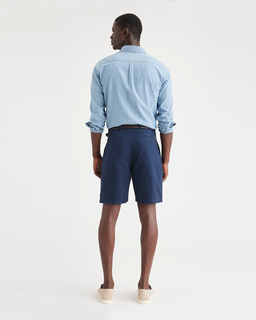 Back view of model wearing Navy Original Pleated 8.5" Short, Classic Fit.