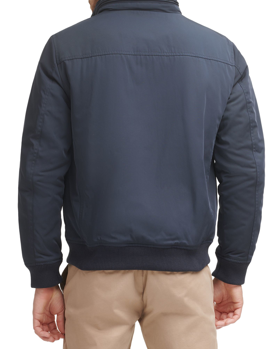 Back view of model wearing Navy Polytwill 2-Pocket Military Bomber Jacket.