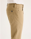 Side view of model wearing New British Khaki All-Day 5-Pocket, Slim Fit.