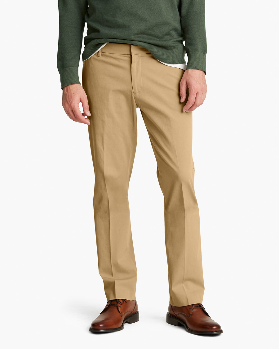 Front view of model wearing New British Khaki City Tech Trousers, Straight Fit.