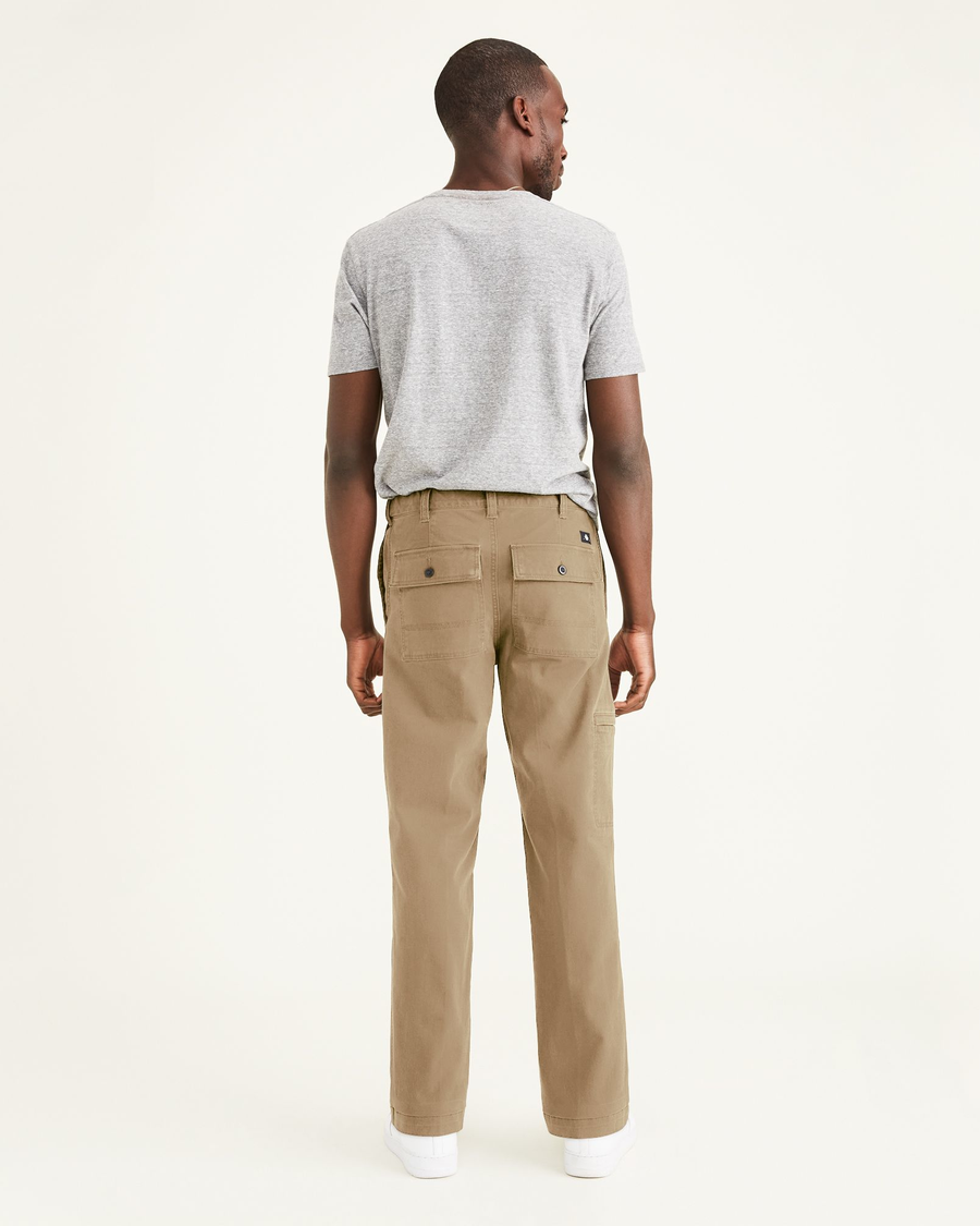 Back view of model wearing New British Khaki Go-To Cargos, Straight Fit.