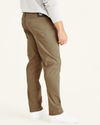 Side view of model wearing New British Khaki Jean Cut Pants, Straight Fit (Big and Tall).