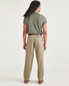 Back view of model wearing New British Khaki Signature Iron Free Khakis, Pleated, Relaxed Fit with Stain Defender®.