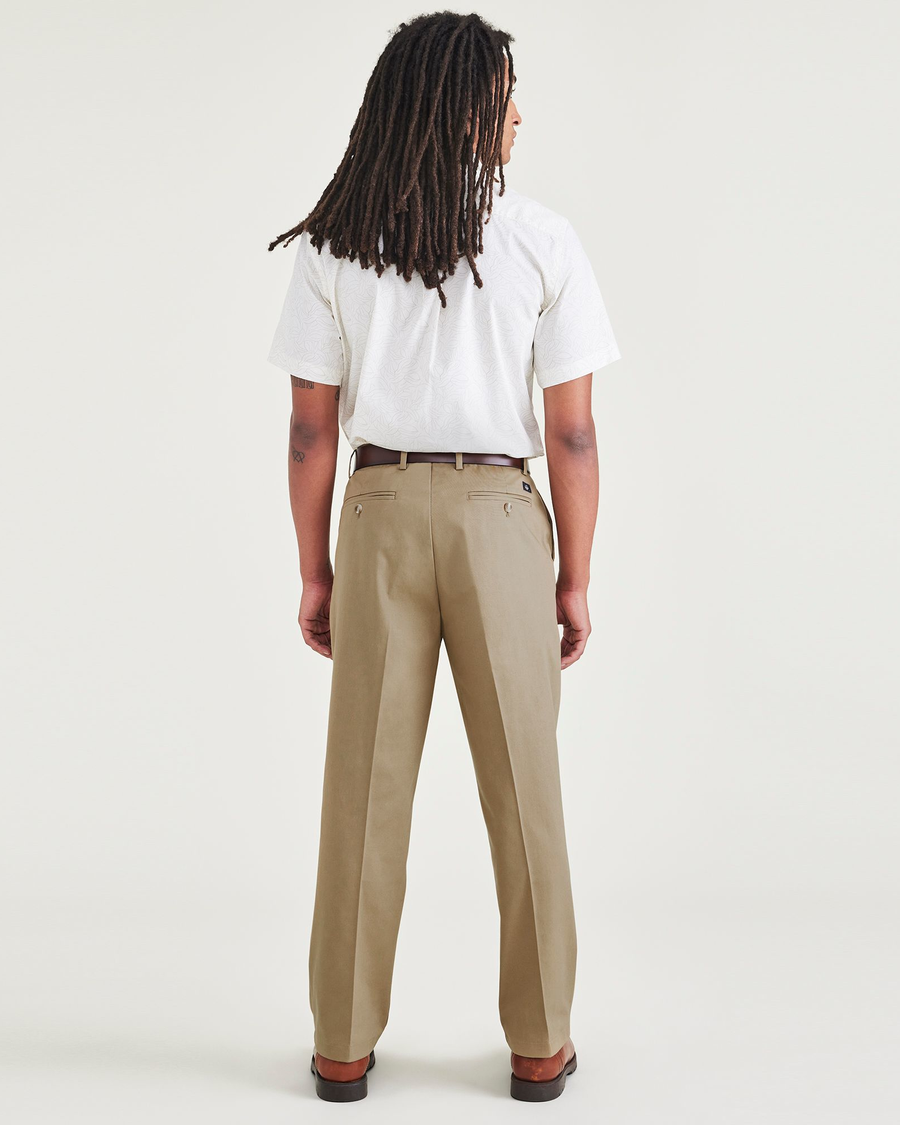 Back view of model wearing New British Khaki Signature Iron Free Khakis, Relaxed Fit with Stain Defender®.
